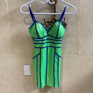 Green Party dress with blue stitching